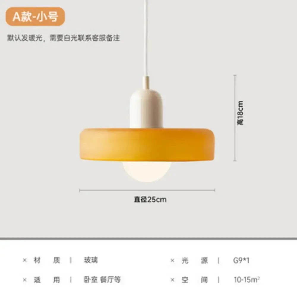 A yellow and olive green nordic canteen chandelier kitchen pendant light with a warm amber glass shade and cream nordic base