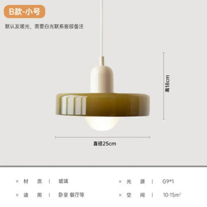 A modern yellow and olive green nordic canteen chandelier with a frosted glass shade and ribbed ceramic ring decorbites cream nordic