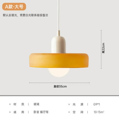 A yellow and olive green nordic canteen chandelier kitchen pendant light with warm amber glass shade and white ceramic base