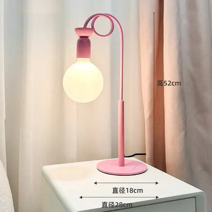 Pink metal desk lamp with curved neck and frosted bulb complements decorbites colorful led floor lamp bedroom art light