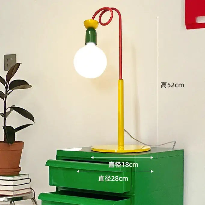 A colorful led floor lamp with a curved red stem yellow base green accents and white globe shade for bedroom decorbites colorful led