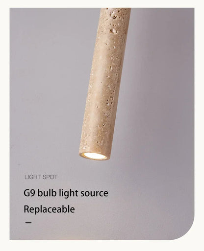 Textured beige concrete stone pendant light with a warm glow ideal for bedroom lighting in yellow stone pendant style