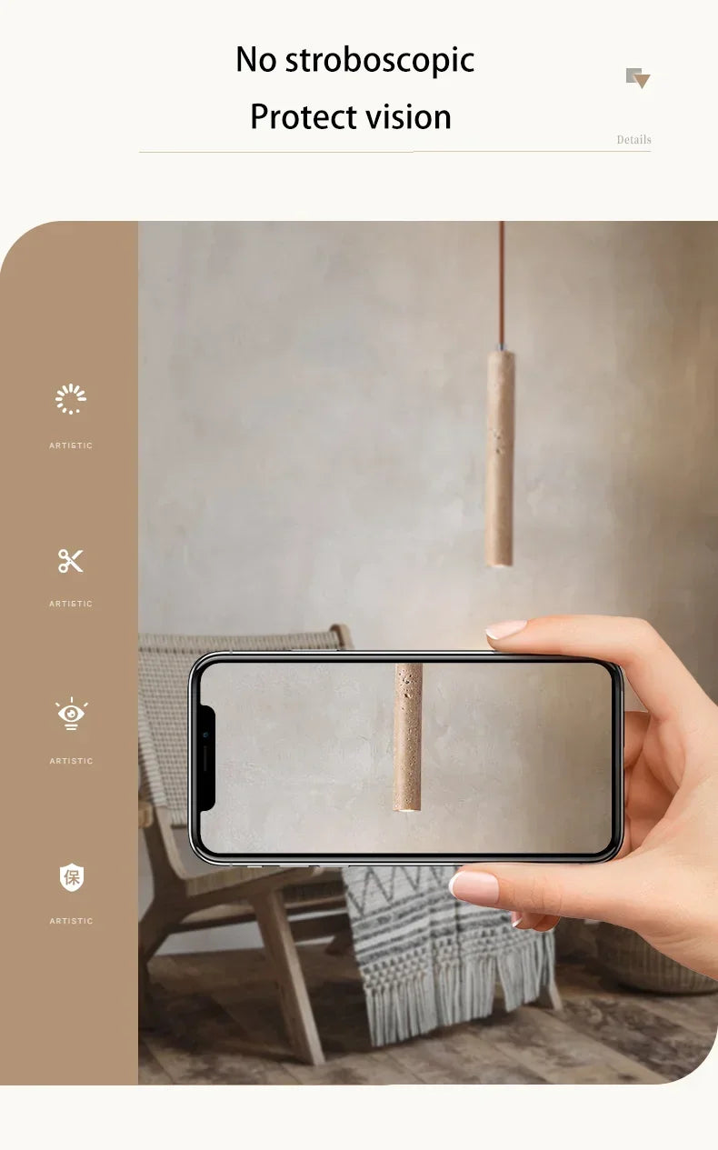 A sleek cylindrical wooden stone pendant light with smooth finish and subtle engravings for bedroom use