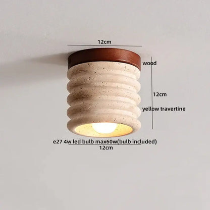 Rounded ceiling light fixture with warm wood top and textured yellow travertine body for bedroom decorbites led yellow