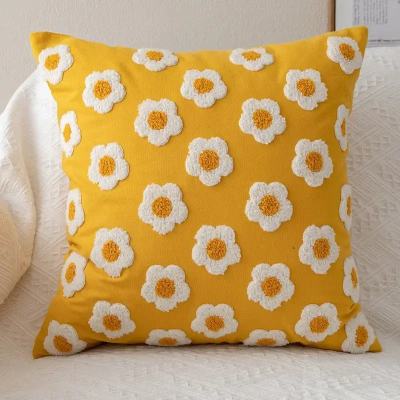 Yellow and white embroidered flora cotton pillow cover featuring vibrant daisy patterns for bedroom use